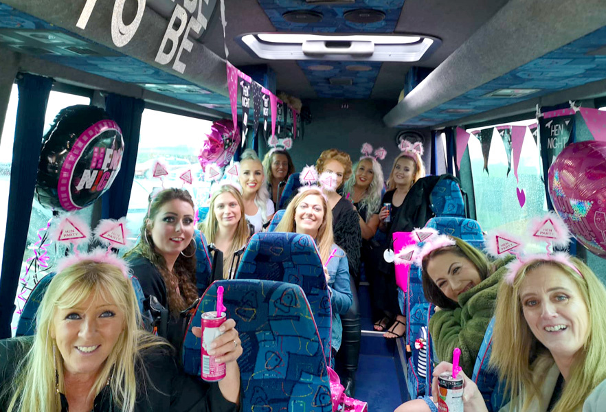 Hen do passengers ready to enjoy their trip on a 16 seater with Lancaster Minibuses